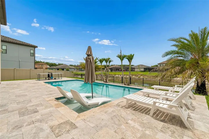 Refreshing pool with Cool Travertine