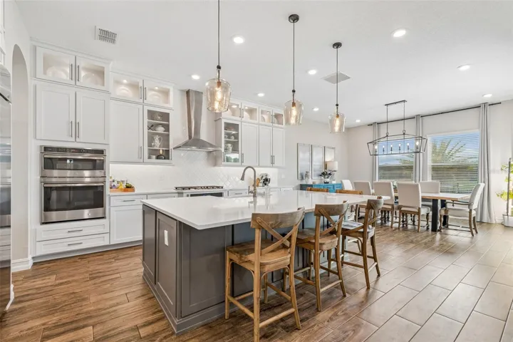 Gourmet Kitchen with Glass Display Cabinetry