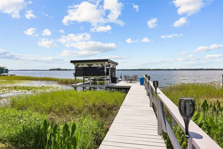 Private dock and Boat house on Lake Dora
