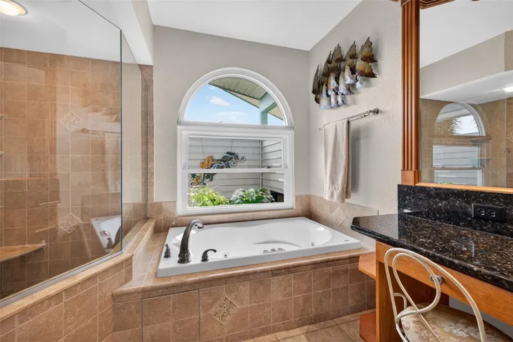 No need for a window covering; you can let the let stream in! Perfect secret garden area is plumbed, in case you have a green thumb