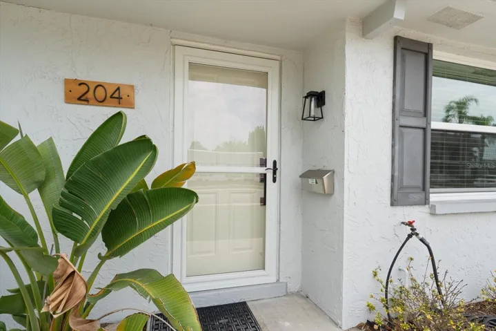 Front door with impact storm door.