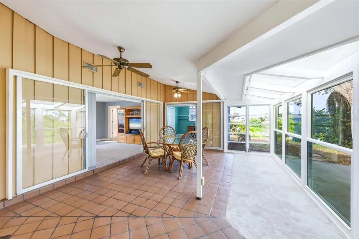 Venice Gardens Lakefront Home with Expansive Florida Room