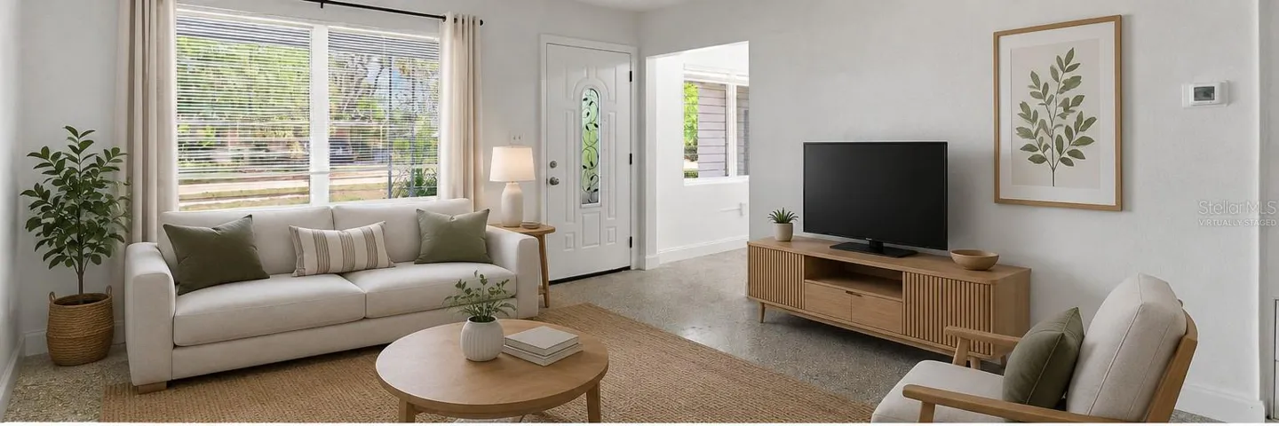 Virtually staged main home living room 1