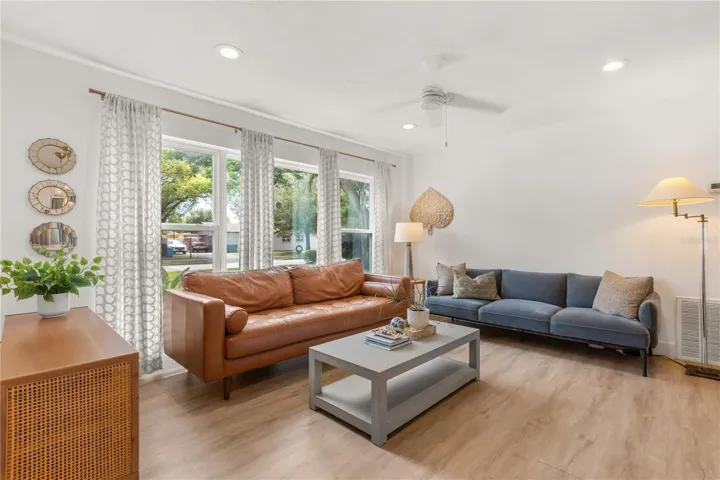 Entryway looking into living room and kitchen