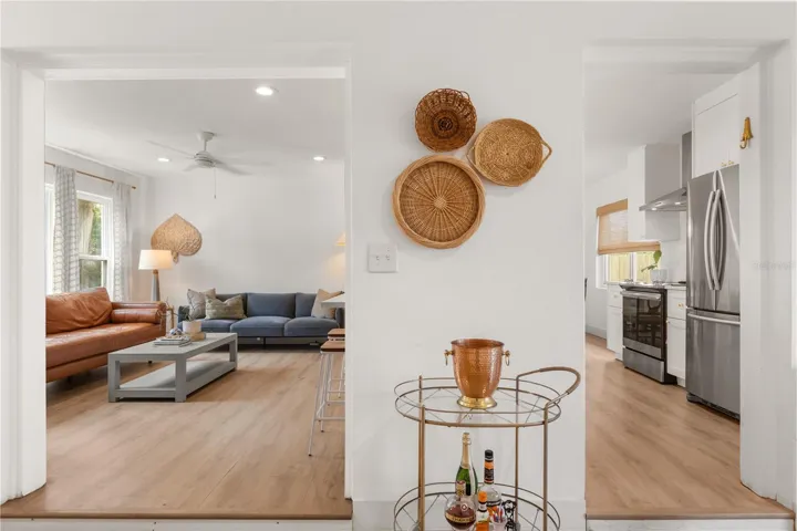 Entryway looking into living room and kitchen