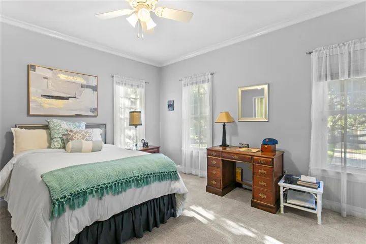 The third bedroom shares a Jack-and-Jill bathroom with it's own sink
