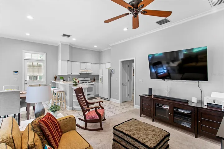 The mother-in-law suite with full kitchen, informal dining space and living room
