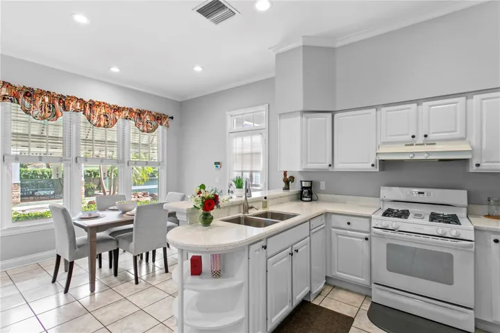 The full kitchen in the guest suite provides added flexibility for holidays, entertaining, or long-term guests.