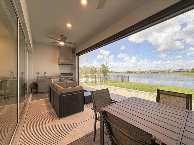 Motorized screened in enclosure for year round indoor-outdoor living