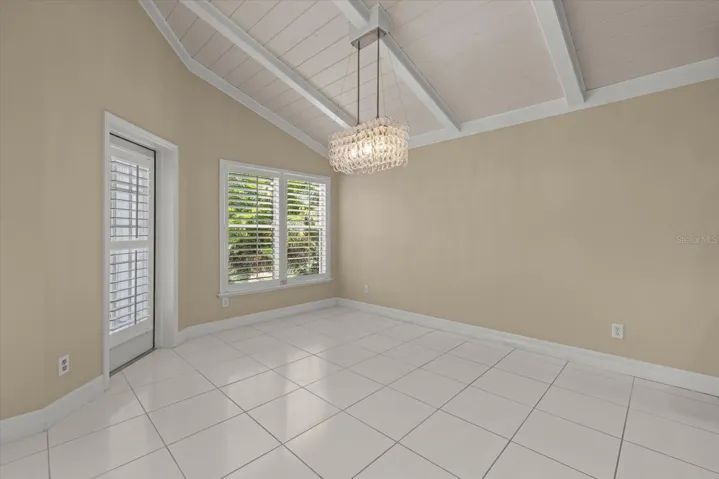 Dining Room with Decorative Glass Chandelier