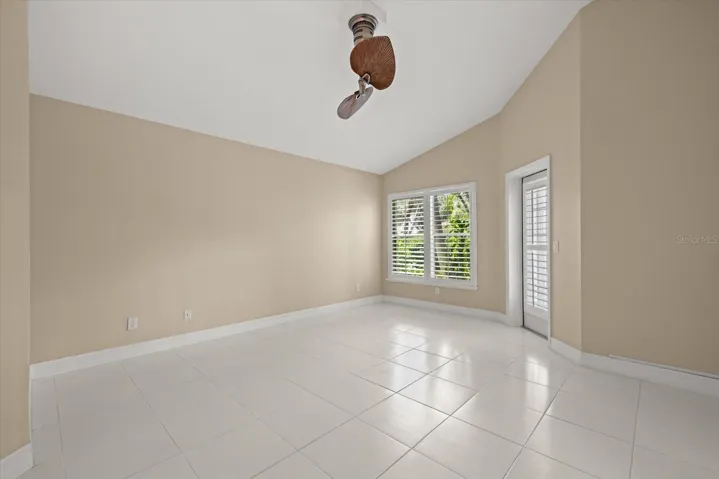 Primary Suite with door to the Florida Room