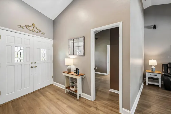 Foyer with view for gorgeous front double doors