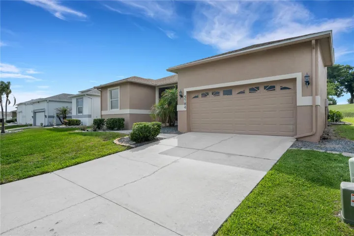 Driveway leading up to 2-car garage