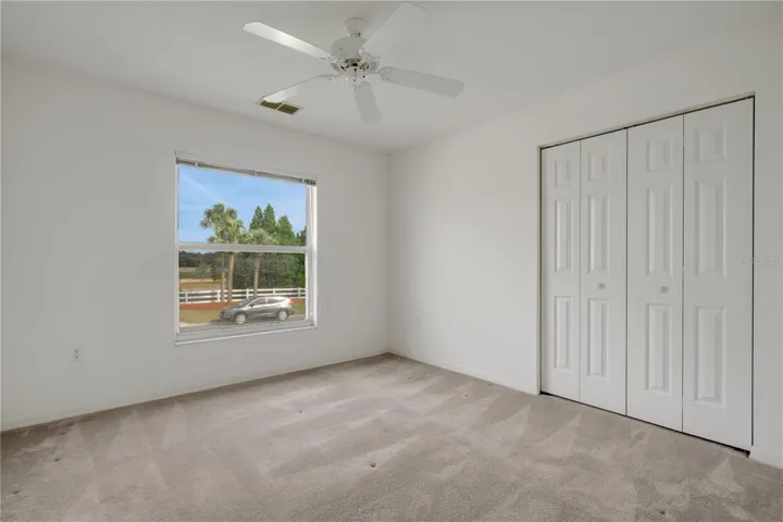 Bedroom 3 with window overlooking front yard
