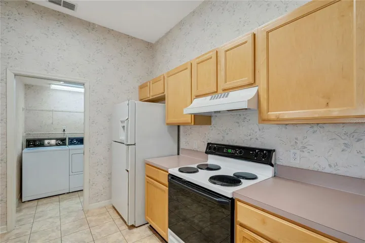 Kitchen with laundry room