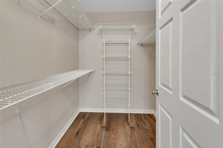 Primary walk-in closet.