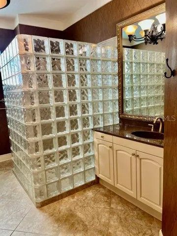 Primary bathroom sink and cabinet 2