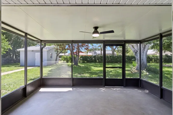 covered and screened back porch