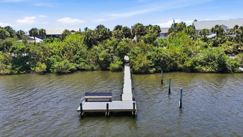 Enjoy watching the boats cruise along from your newer dock on the Bay