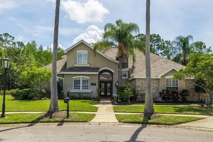 MAJESTIC EXECUTIVE HOME ON LARGE CONSERVATION LOT!
