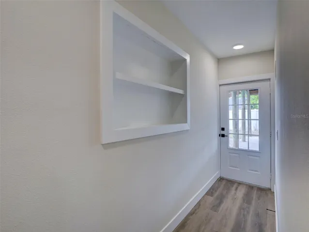 Hall space with rear entrance