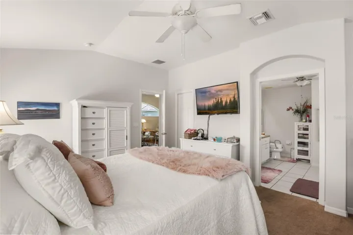 Primary bedroom retreat with direct access to the ensuite bath.