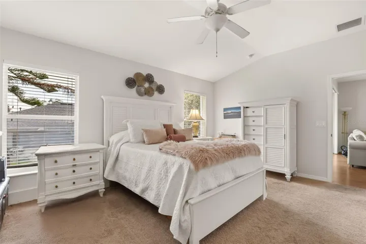 Spacious primary suite featuring plenty of natural light and room for oversized furniture.