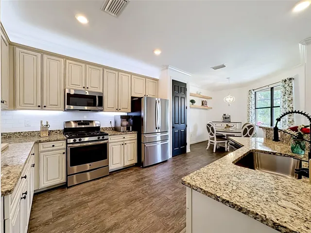 Spacious kitchen with stainless appliances