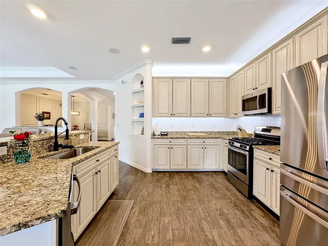 Granite countertops and 42 inch wood cabinets