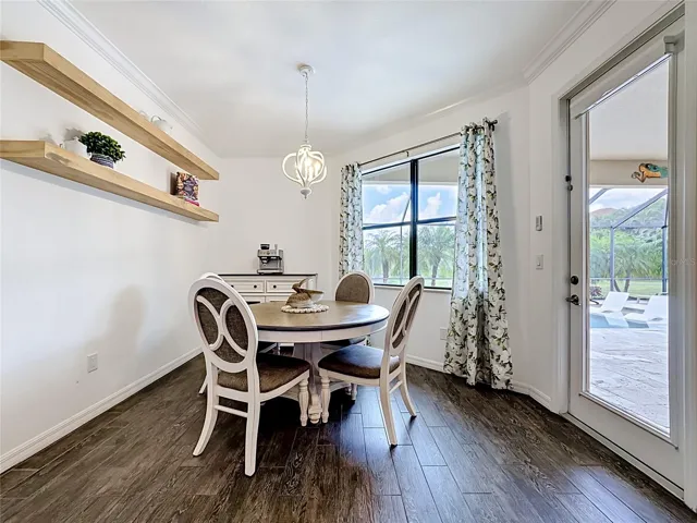 Dinette with access to the lanai and pool