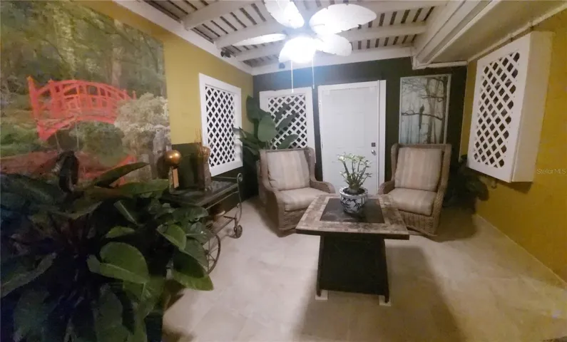 Hottub Covered Porch with door to Outside
