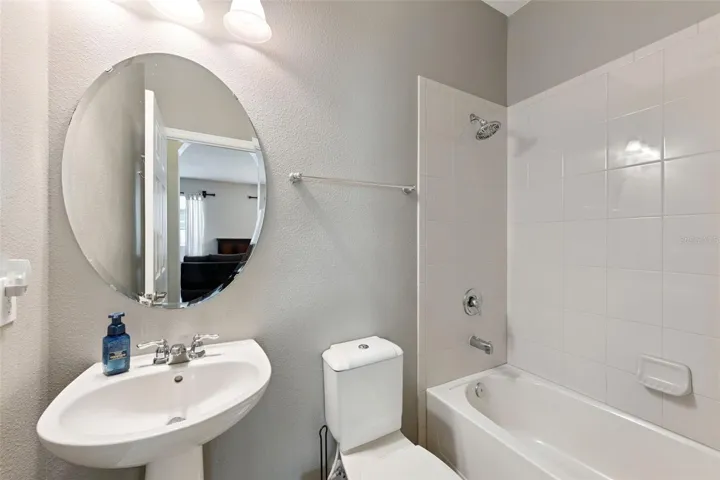 Guest bath located at the front of the home