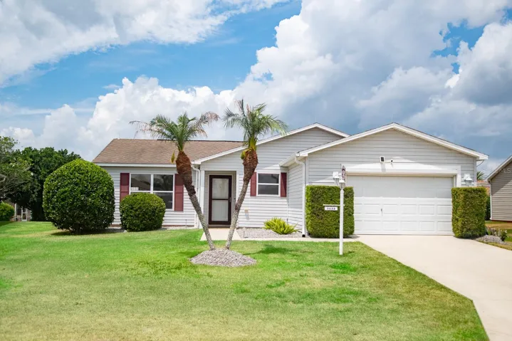 TURNKEY WITH GOLF CART! This beautifully maintained home is truly move-in ready and even includes a low mileage 2015 golf cart, making it easy to start enjoying The Villages lifestyle from day one.