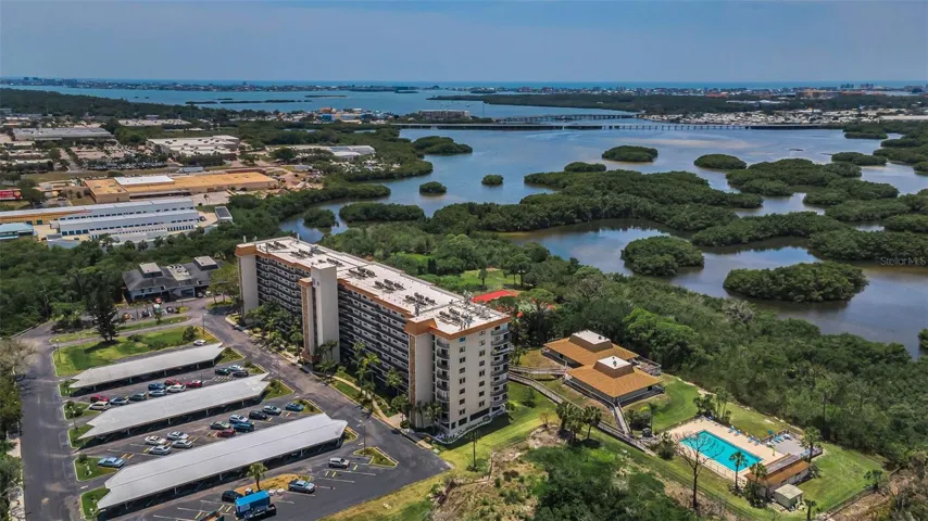 Close up view of Otter Key, the Association recreation areas, the huge heated pool, tennis & pickleball courts, Cross Bayou and Ocean waters beyond!