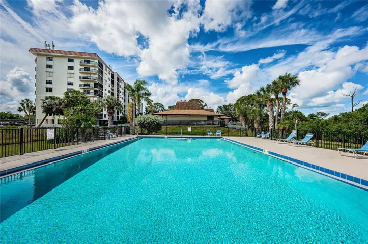 Spectacular heated pool with Condos in the background.