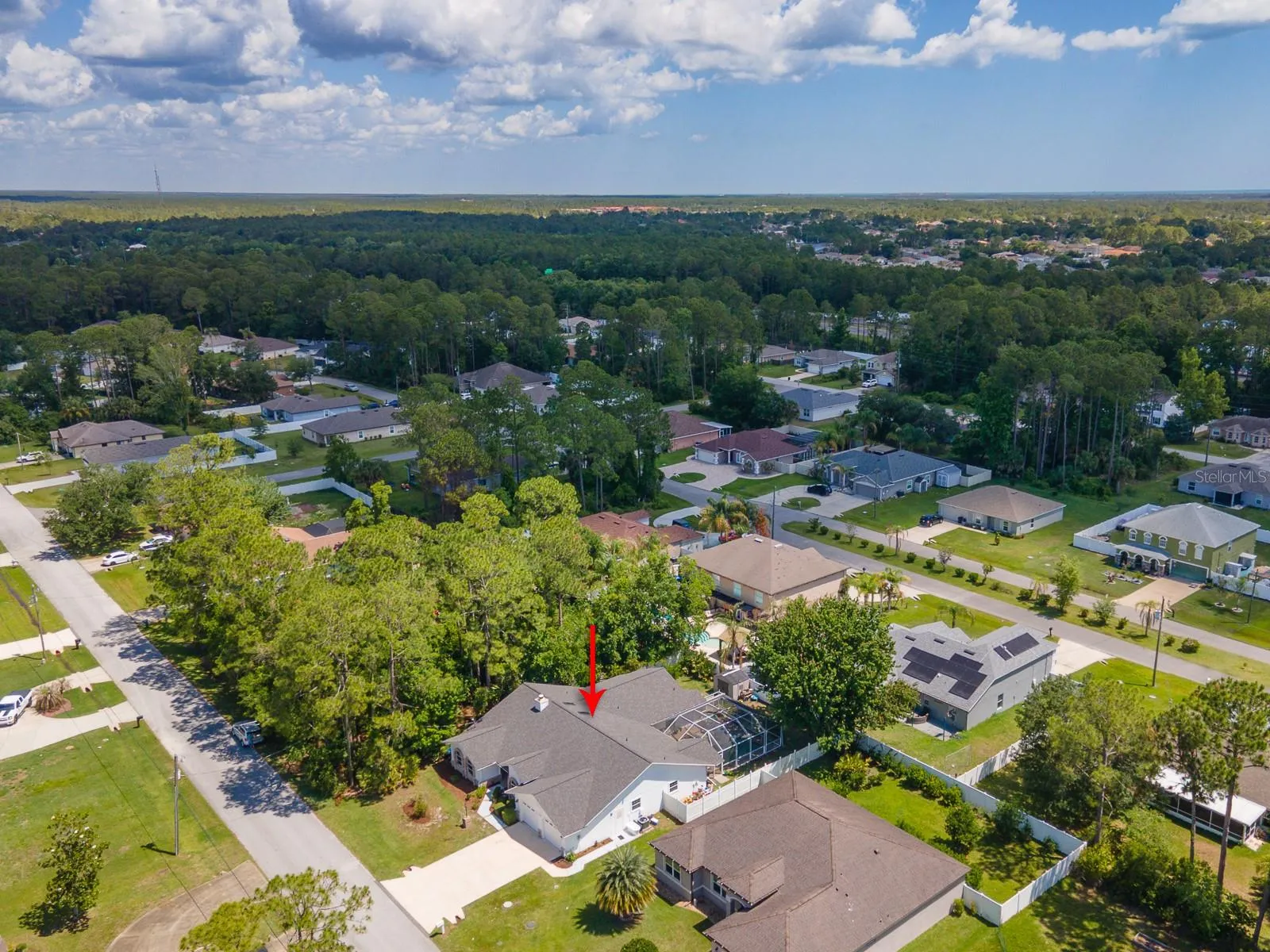 House plus wooded lot
