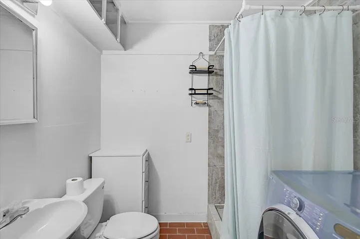 Full bathroom and Laundry Room off the Lanai.