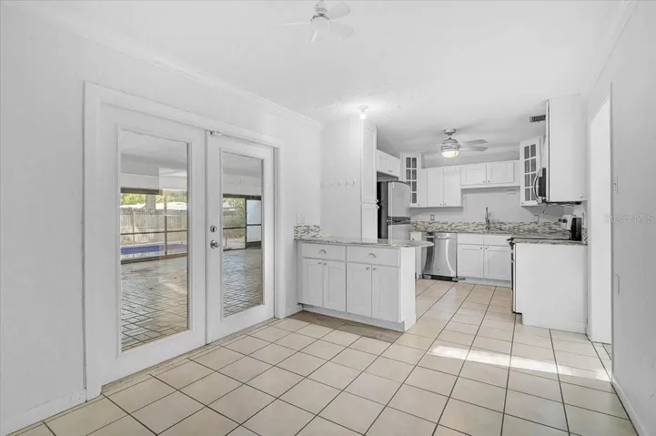 Kitchen with Stainless Steel appliances.