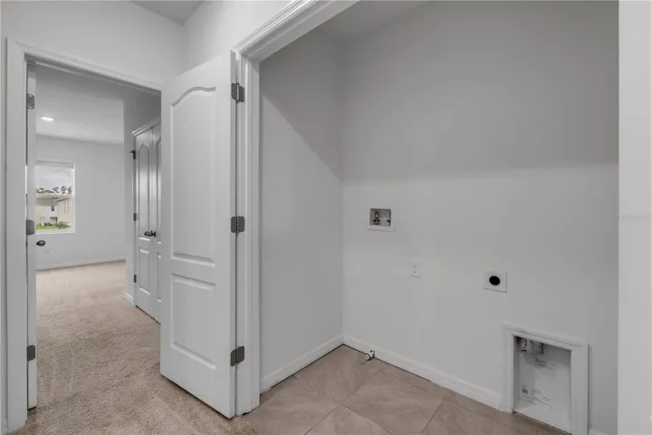 Laundry Closet and Entry to Bedroom 3