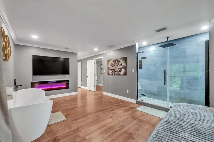 Primary suite with rain shower head & soaking tub