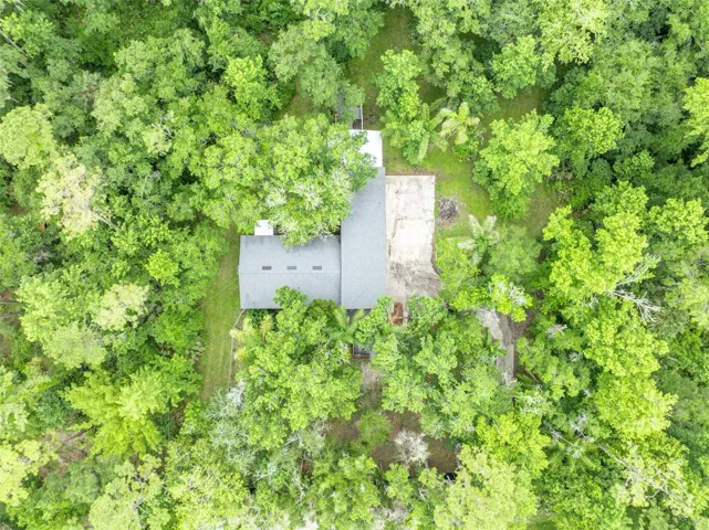 Birdseye view of home and newer roof