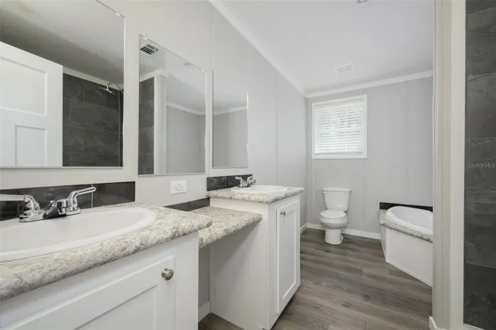 Dual vanities, garden tub, separate walk-in shower