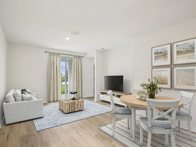 Interior photos are not of the actual home but are photos of the builder home with same floorplan with similar interior finishes and features. Photo uses virtual staging.
