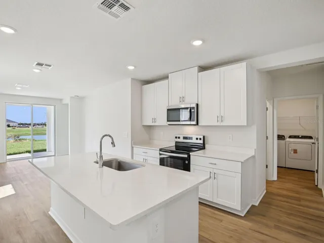 Interior photos are not of the actual home but are photos of the builder home with the same floorplan with similar interior finishes and features.