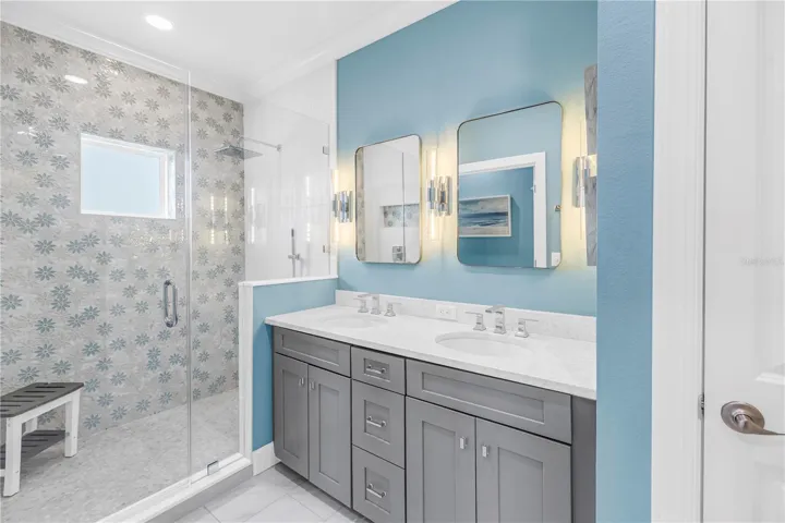 Primary Bath Featuring Dual Sinks Large Shower