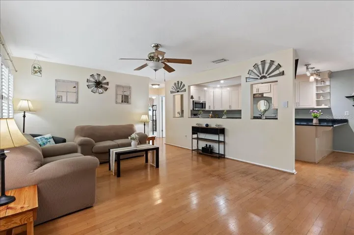 Living room with open views to the kitchen.