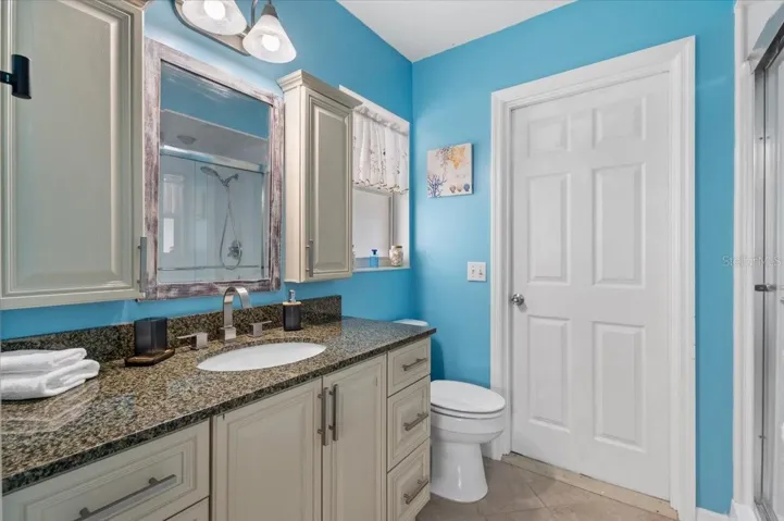 Ensuite for Primary bedroom.  Access to Garage.