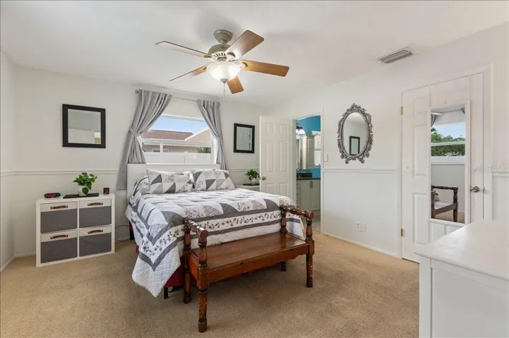 Primary bedroom with ensuite and walk in closet.