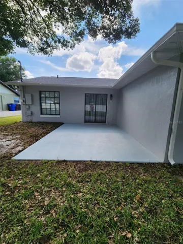 patio with sliding doors to home