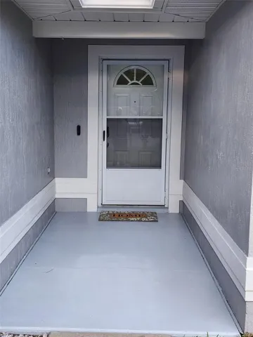 Newly painted front entryway slab